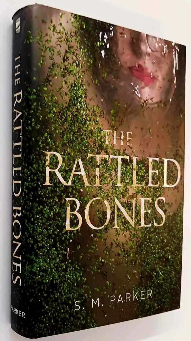 THE RATTLED BONES - S.M. Parker